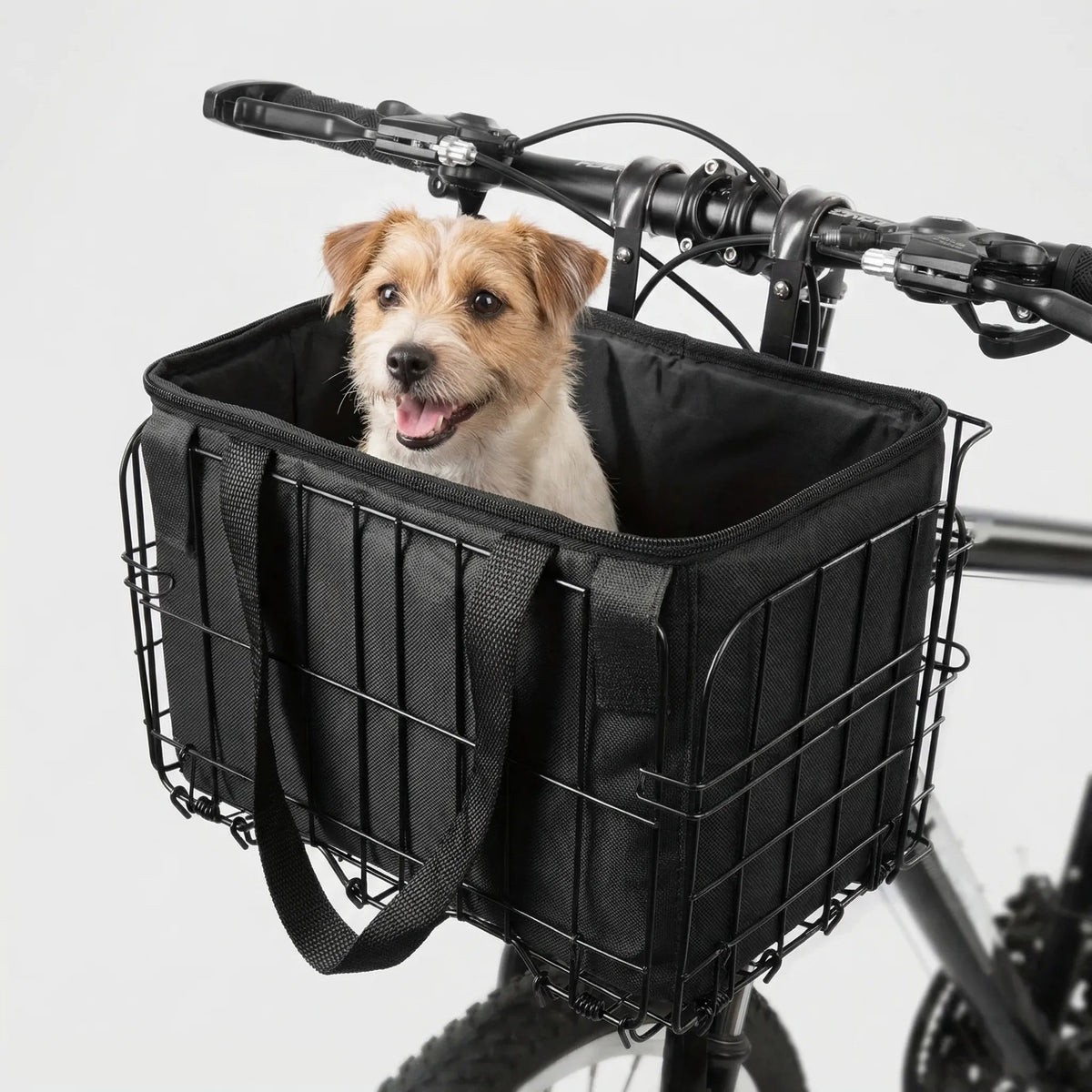 Cykelkurv foran i sort på styret med lille hund – produktfoto