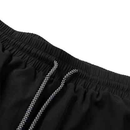 Herre sportshorts – geometrisk design & sidelommer